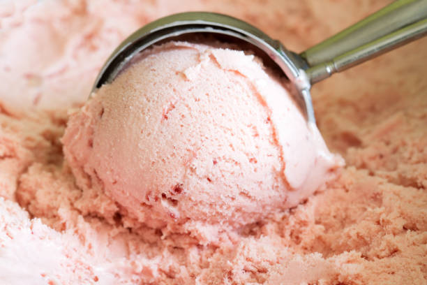istock Strawberry scoop ice cream background concept 965401326