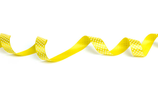 istock Yellow ribbons isolated on white 965412174