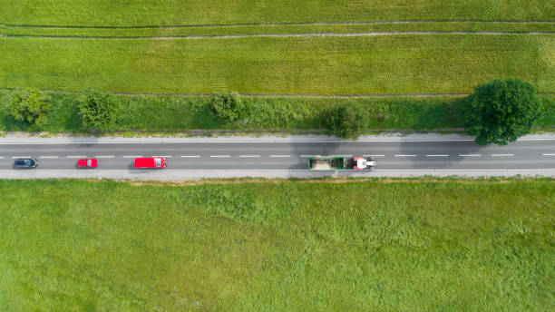 istock Road through agricultural area, aerial view 965416858
