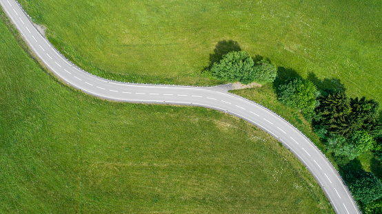 Winding road through rural scene - aerial view