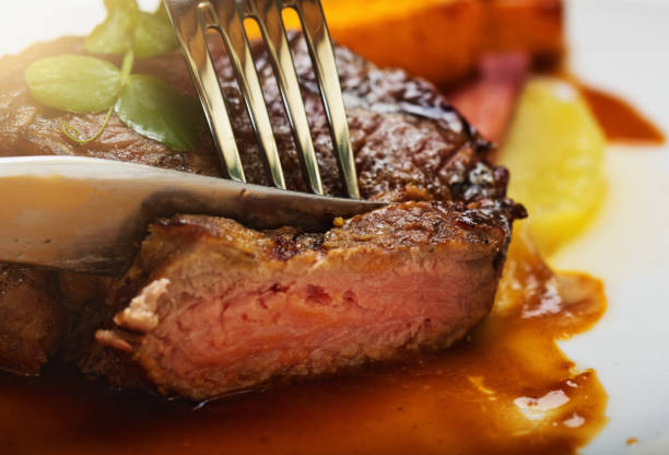 istock Appetizing fillet steak being sliced 965417532