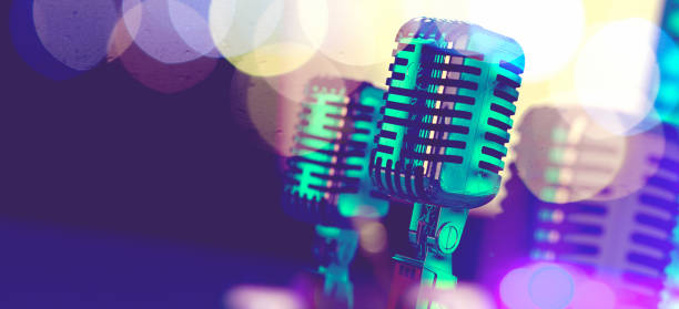Microphone and stage lights.Concert and music concept.3d illustration"n stock photo