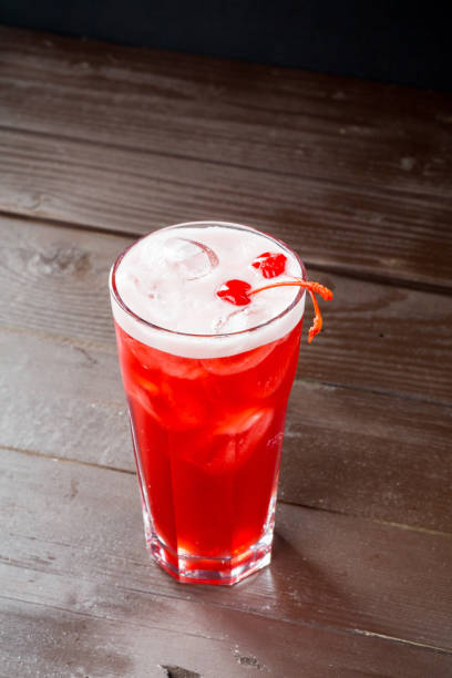 istock Rose coctail with ice on black background 965420644
