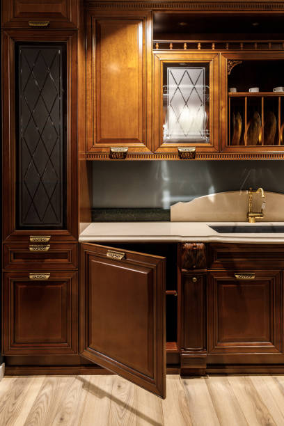 istock Renovated kitchen interior with stylish wooden cabinets 965421112