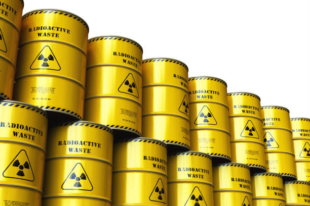 istock Group of stacked yellow drums with radioactive waste 965421598