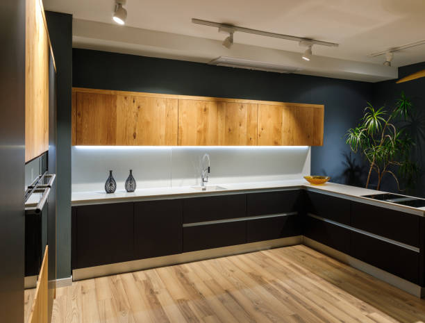 istock Stylish kitchen with modern white counter and sink 965424100