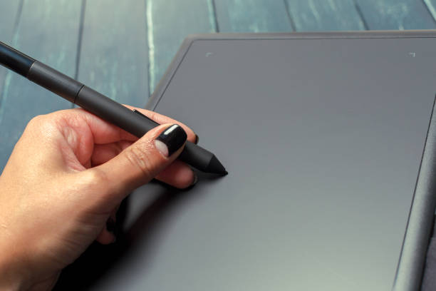 istock Hand of graphic designer working with stilus and tablet 965424518