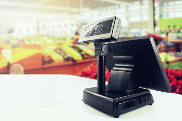cash register on desk at grocery store - pos supermarket imagens e fotografias de stock