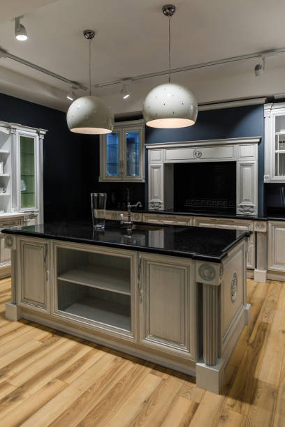 istock Interior of modern kitchen with lamps over counter 965427918