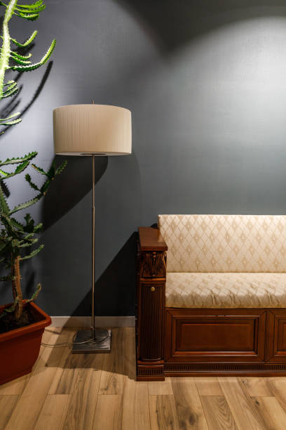 istock Lamp by vintage style sofa in cozy room 965428854