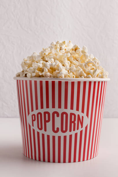 istock Bucket of popcorn on white background 965432840