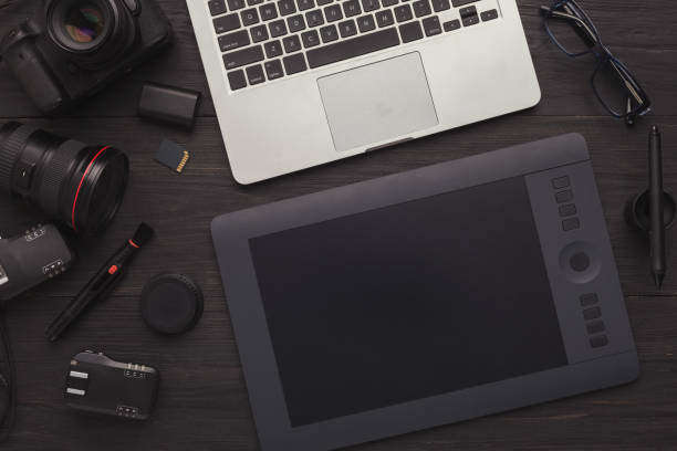 istock Designer workplace with graphic tablet and laptop 965433300