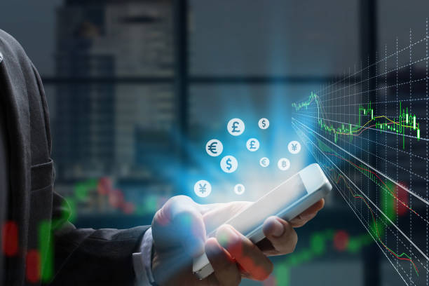 istock Double exposure businessman using the smart phone and stock market or forex graph 965433514