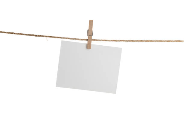 istock Blank Card Hanging on Clothesline Isolated 965435812