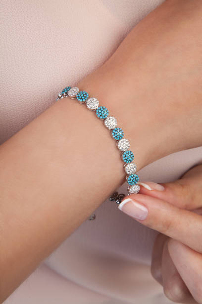 istock Rose Gold Diamond Bracelet with Blue Gem Stones 965436352