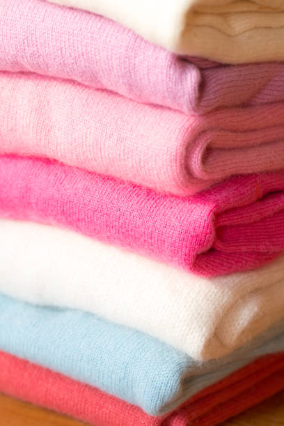 istock A stack of knitted sweaters of different colors lies. 965436572