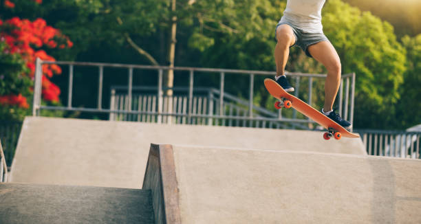 istock skateboarder skateboarding on skatepark ramp 965439772
