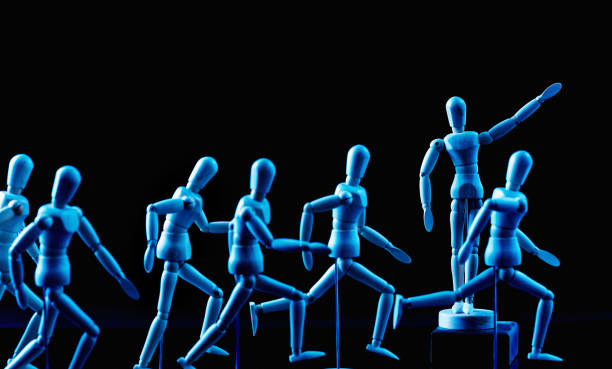 istock Leader encourages his followers forward 965440098