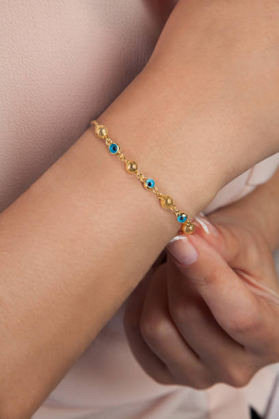 istock Gold Bracelet with Evil Eye Stones 965441380