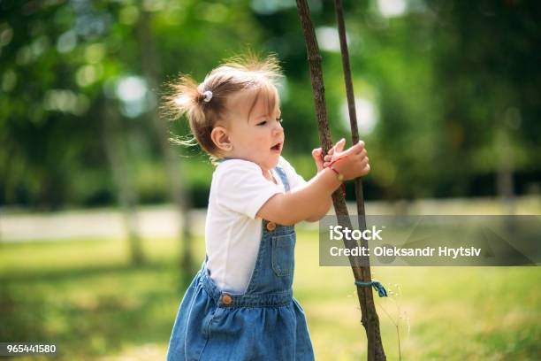 Happy Child Walks In The Park In Summer Stock Photo - Download Image Now - Adult, Backgrounds, Beauty