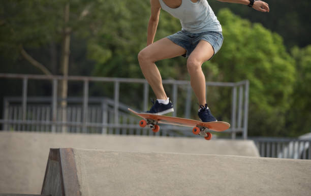 istock skateboarder skateboarding on skatepark ramp 965444256