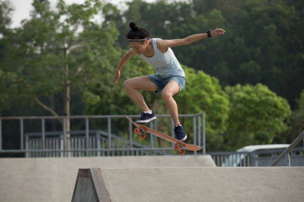 istock skateboarder skateboarding on skatepark ramp 965444564