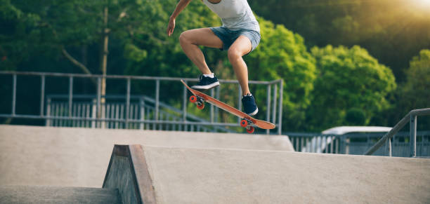 istock skateboarder skateboarding on skatepark ramp 965447220