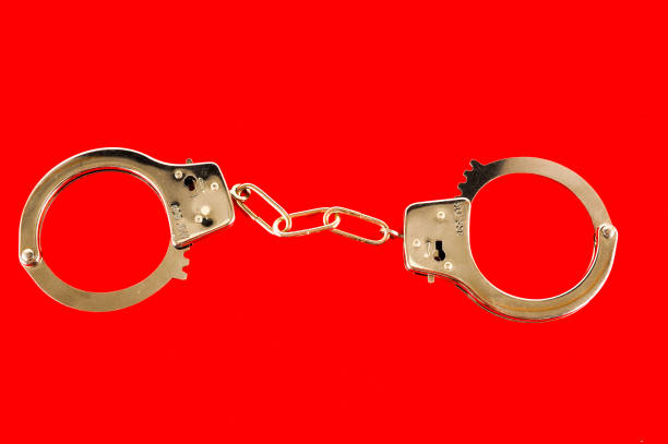 istock Close-up of handcuffs 965447968