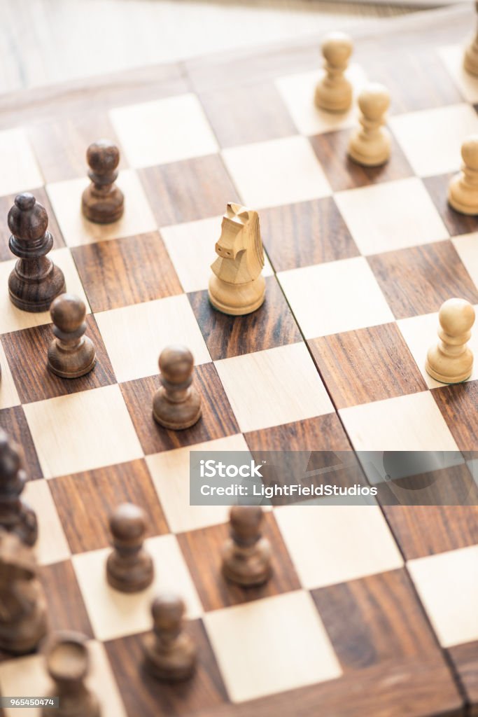 close-up view of wooden chess board with chess board Achievement Stock Photo