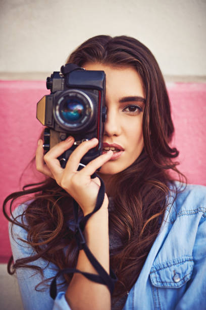istock She takes her camera everywhere to capture memories 965450968