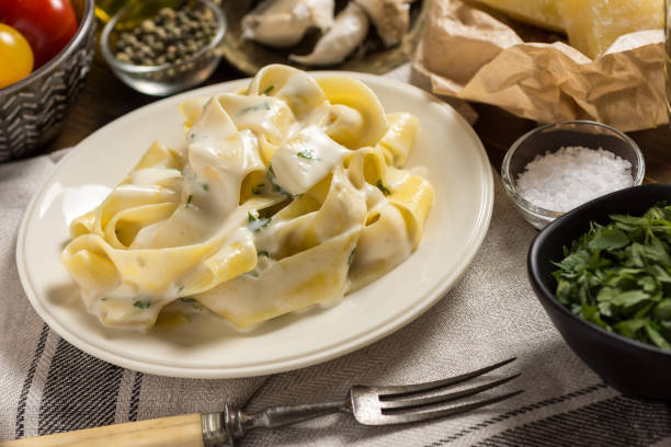 istock Fettuccine Pasta Plate with Creamy Alfredo Sauce 965455772
