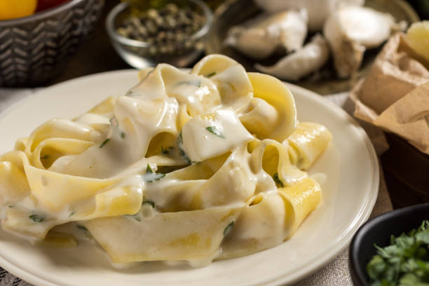 istock Fettuccine Pasta Plate with Creamy Alfredo Sauce 965455952