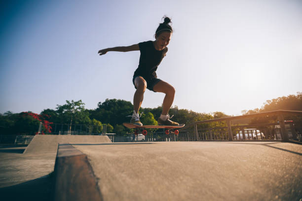 istock skateboarder skateboarding on skatepark ramp 965466366