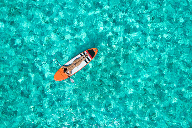 istock Woman on the paddleboard 965466376
