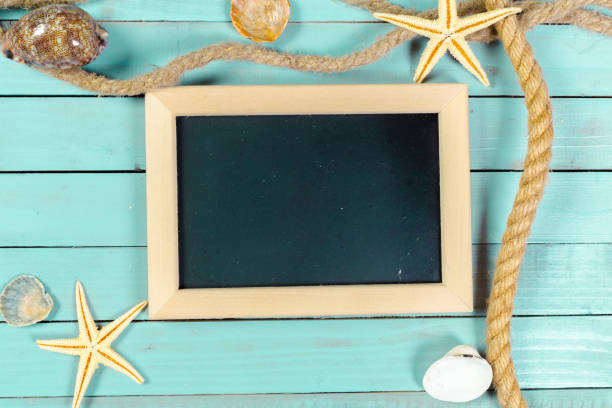 istock Small wooden framed blank blackboard for your design 965469884