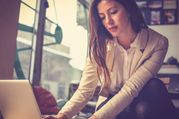 istock Young business woman working. 965474000