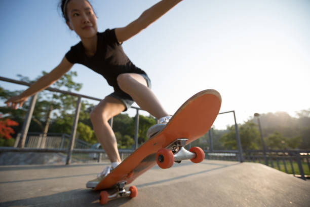 istock skateboarder skateboarding on skatepark ramp 965474572