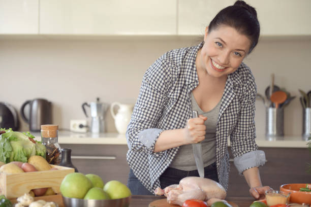 istock woman cooking in the kitchen 965488522