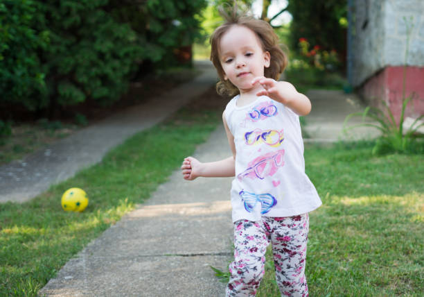 istock Little girl running 965492246