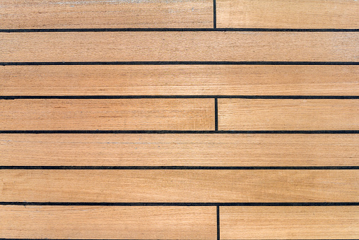 Deck fragment by the ship - wooden boards as background.