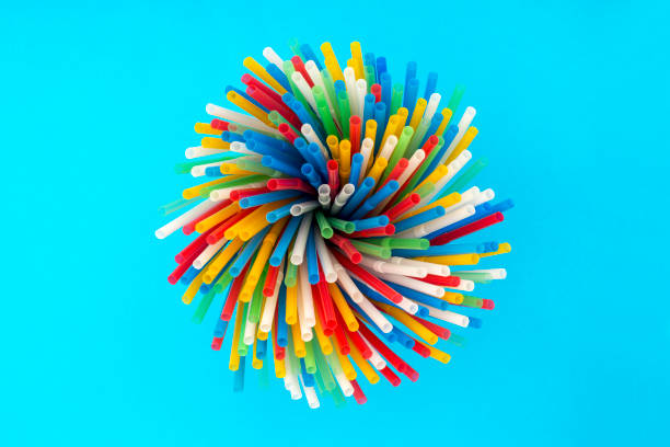 istock Abstract Still Life with Cocktail Tubes on a blue background 965495668