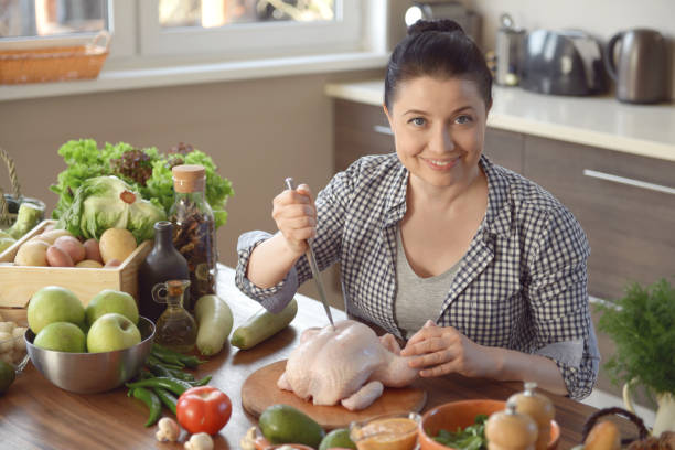 istock woman cooking in the kitchen 965495962