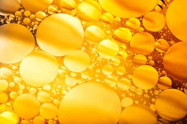 istock Yellow Soap Bubbles 1 - Water Abstract Macro Foam Background 965500024