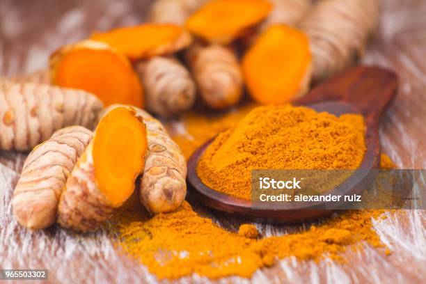 Turmeric Powder And Roots Stock Photo - Download Image Now - Turmeric, Curcumin, Ground - Culinary