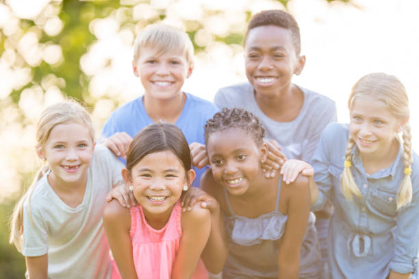 istock Kids Posing For Photo On A Sunny Day 965503386