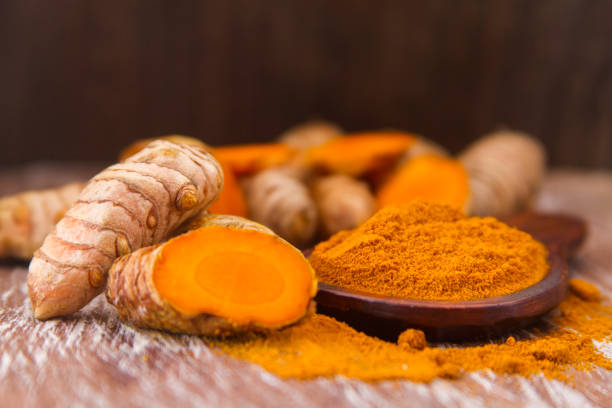 istock turmeric powder and roots 965503494