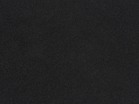 Textura de goma espuma. Fondo negro de la esponja. Poliestireno oscuro photo
