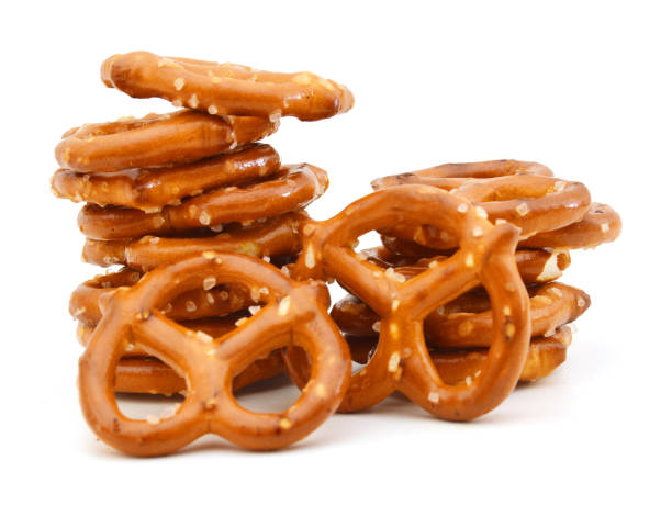 pretzels isolated on a white background - pretzel imagens e fotografias de stock