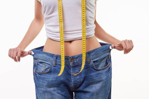 похудеть - weight loss стоковые фото и изображения