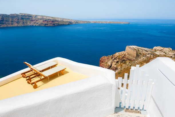 istock Chaise lounges on the terrace with sea view. 965538142